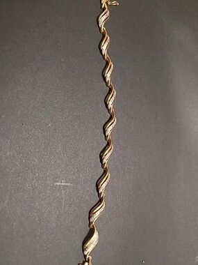 Gold Tone Wavy Link Bracelet with Crystal Accents